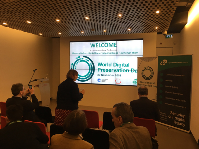 At the front in a room with people at the Digital Preservation Award event 2018